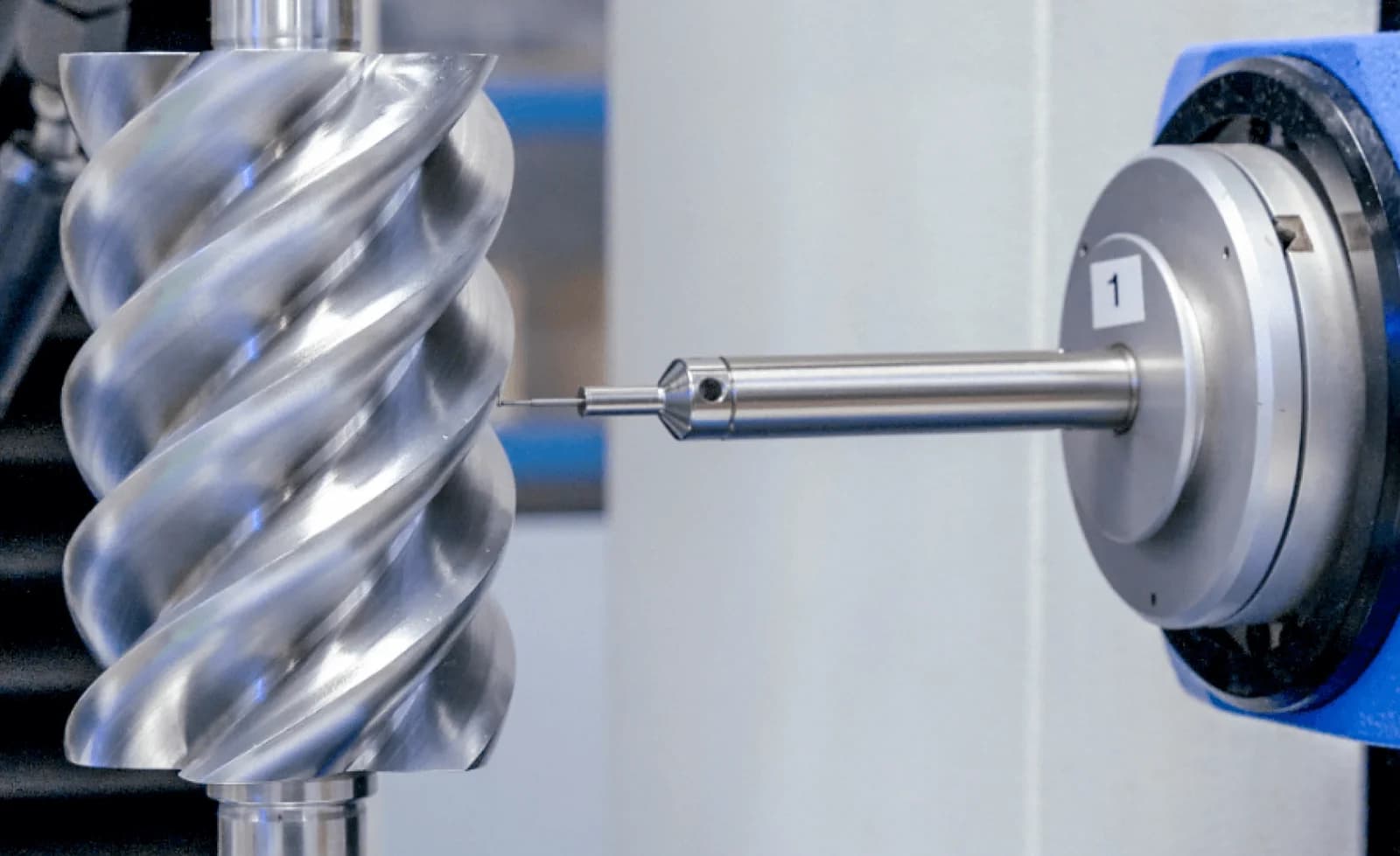 Precision machining of a compressor screw element